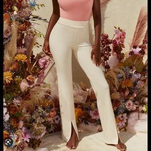 Oh Polly | Make a move  
PETITE HIGH WAISTED SPLIT HEM TROUSERS IN IVORY